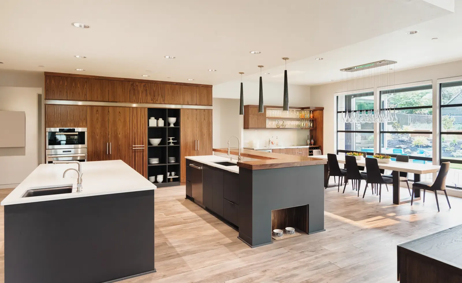 Open-plan kitchen and dining room with smooth, freshly plastered walls and ceilings
